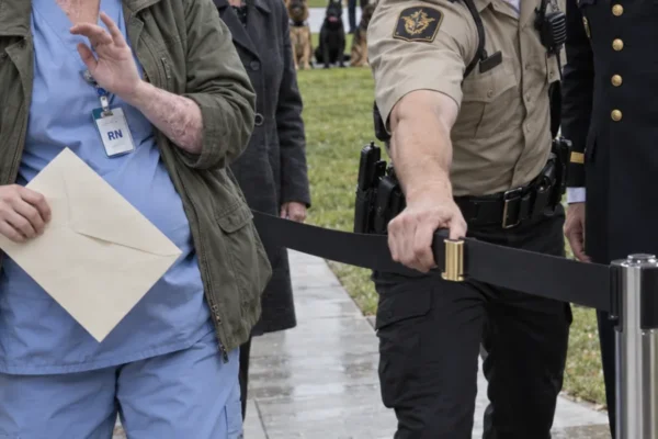 The Scarred Nurse Was Asked to Leave the Memorial — Then 7 K9 Dogs Formation for Her